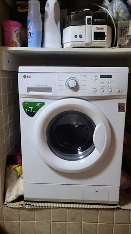 LG 7 kg Front Load Washing Machine with free transportation if nearby