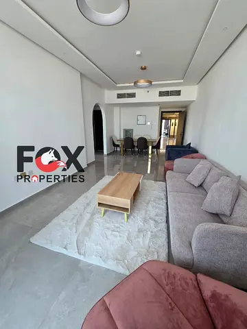2BR for annual rent in Al Nuaimiya 3, Ajman. Unfurnished, balcony & free parking. AED 53,000/year, 4 or 5 payments. Cheque deposit.7
