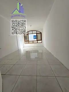 Spacious 2-bedroom apartment in Al Majaz 2, featuring 2 bathrooms and central AC, in a prime locatio