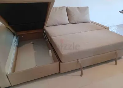 Beige L-Shaped Sofa Bed with Integrated Storage
