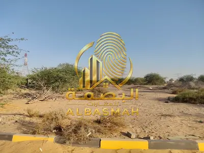 Prime Corner Industrial Plot for Sale in Al Sajaa with Main Road Frontage and 99-Year Usufruct