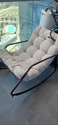 Brand New! Beige cushioned rocking lounge chair!