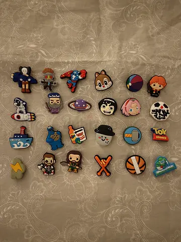 Small collection of assorted cartoon rubber shoe charms (26 pieces)