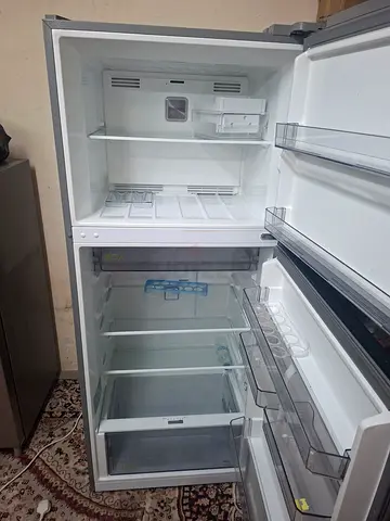 Used double-door refrigerator in good working condition