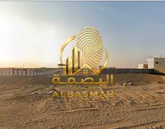 For sale: a prime industrial plot of land measuring 10,000 square feet, featuring a square shape tha