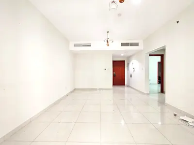Fron Of Sahara Center __ On Month Free Parking Free __ 2 Bedroom Apt 2 Full Bathroom __ 6 Cheques Payment Maintenance free __ Call Mr Adnan