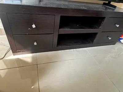 Dark wood TV cabinet with drawers and open shelves - good for living room