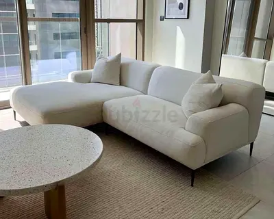 Modern L-shaped Cream Fabric Sofa with Chaise - Good Condition