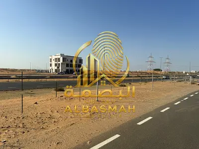 للبيع ارض تجاريه بالشارقه مزيرعه الرحمانيه جسر 5 شارع 97 تملك حر للاخوه العرب