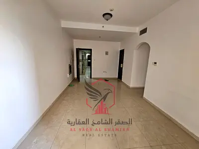 شقة واسعة من غرفتين وصالة مع بلكون باركن وشهر مجاني بالقرب من مخرج دبي في موقع مميز