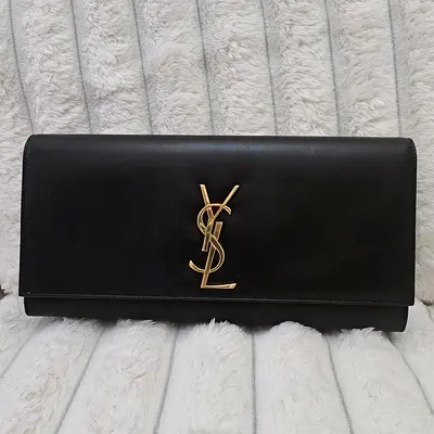Authentic YSL Cassandre Black Leather Clutch with Gold Logo - Selling low!