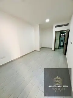 2BR hall first‑tenant unit in Al Nuaimiya 1 near Gulfa Bridge; wide space, 2 baths, open‑view ba