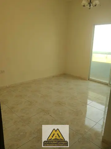 Bedroom for rent in Al Nuaimiya 2, Ajman | Balcony, 2 bathrooms, and standard air conditioning. Fle