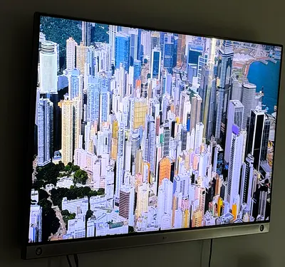 LG 65" LED Wall-Mounted TV in Good Working Condition