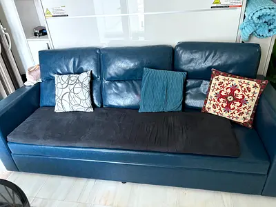Blue 3-Seater Faux Leather Sofa — Good Condition from DanubeHome.
5 years old