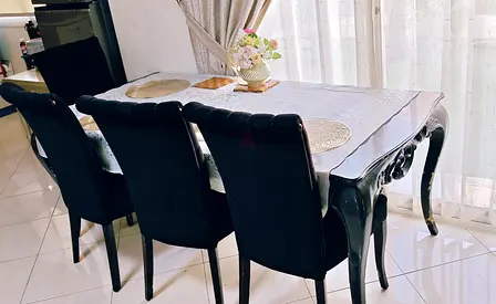 Solid wood dining table with 4 upholstered chairs - elegant black finish