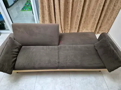 Convertible 3-seater sofa bed in brown fabric - good condition.