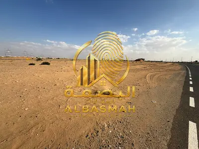 Two adjacent residential plots for sale in Sharjah, Al-Muzairah Al-Rahmaniyah area, freehold ownership for Arab brothers.