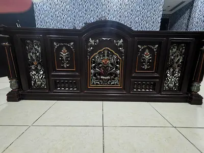 Large Solid Wood handmade carving bed without mattress, night stands and dresser.