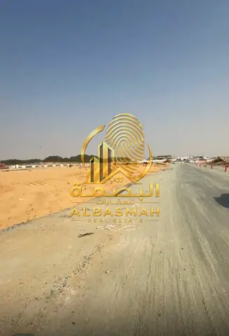للبيع ارض تجاري في الشارقه منطقه مزيرعه ضاحيه الرحمانيه