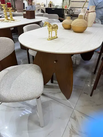 Round wooden dining table with 6 upholstered chairs - light oak