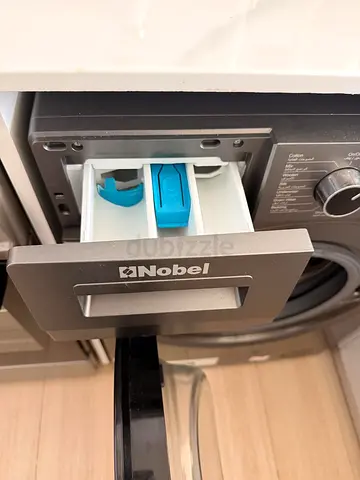 MUST GO! Nobel front-load washing machine - detergent drawer shown, good condition. Open to offers.