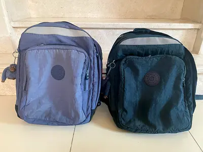 Backpacks – grey and navy blue, good condition