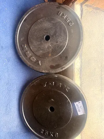 Pair of 25kg iorn Weight Plates - new