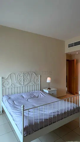 White Metal Frame Bed with Decorative Headboard