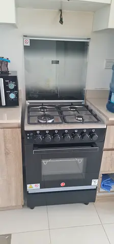 Like new 4-Burner Gas Stove with Oven - Good Working Condition