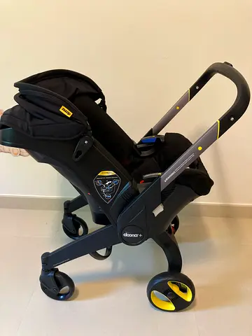 Doona 2in1 Infant Car Seat + Stroller (black) - Foldable travel car seat stroller