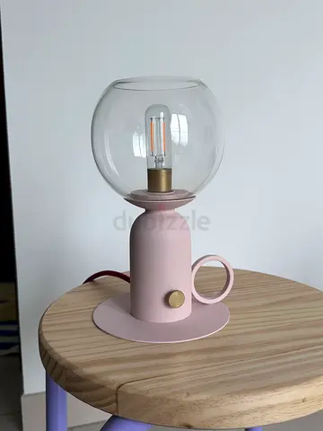 Pink wall/bedside lamp with clear glass globe bulb - good condition