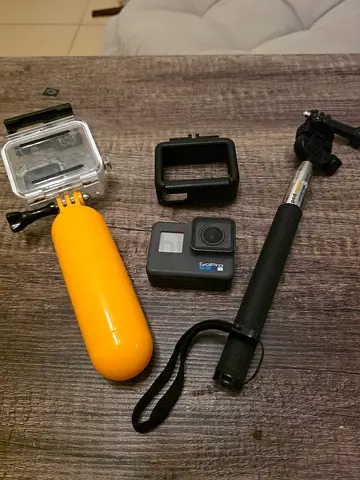 GoPro HERO6 with housing, floaty grip and extendable selfie stick - used