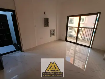 First-occupant 2BR apartment in Al Nakhil, Ajman. 2 baths, balcony, central AC. Annual rent AED 38,000, 4 or 6 payments.