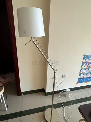 Adjustable white floor lamp with drum shade
