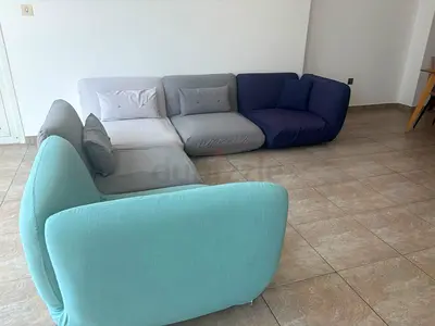 Low-profile modular sectional sofa - pastel mix, good condition