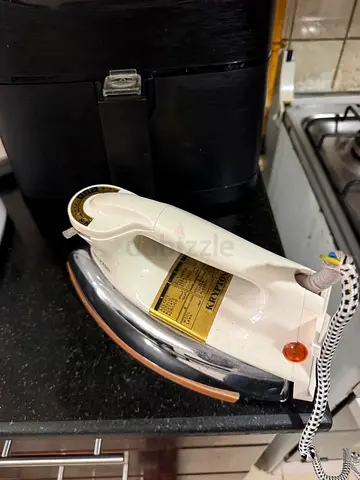 مكواة