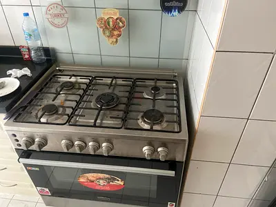Used 4-Burner Gas Cooker with Oven - Good Working Condition