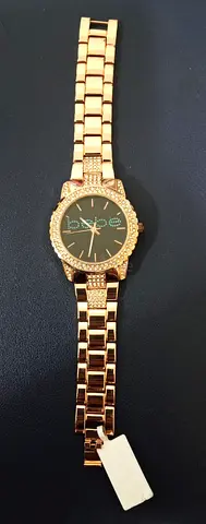 Bebe Gold-tone women's wristwatch with crystal accents Can do good deals