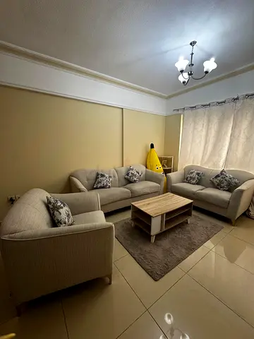 Beige 3-Piece Sofa Set with Coffee Table - Good Condition