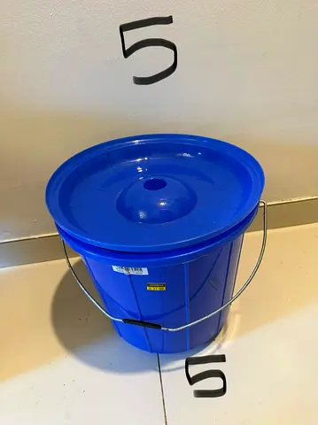 Blue plastic storage bucket with lid and handle - good condition