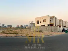 Corner plot for sale in Al Yasmeen, Ajman | Second plot from the main street and near the park | 4,4