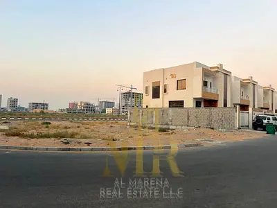 Corner plot for sale in Al Yasmeen, Ajman | Second plot from the main street and near the park | 4,416 sq ft | Residential permit G+2, price includes