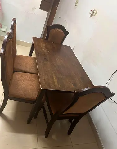 Wooden Table and 4 chairs available in good condition