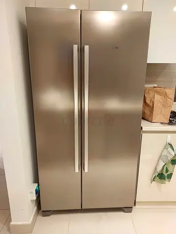 Free deliveryBosch Side-by-side stainless steel refrigerator - good condition