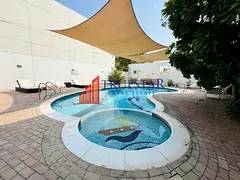 Shared Pool Private Garden 4BR+Maids Close to Beach & Umm Suqeim Park Compound Villa