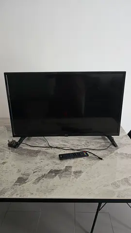 32-inch LED TV with remote and stand - good working condition