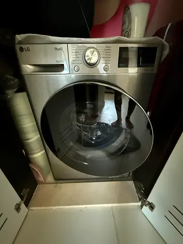 LG Front Load Washing Machine - Compact Stainless Steel, Good Condition