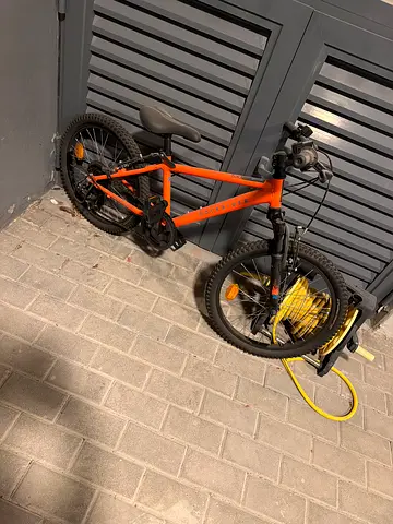 Orange kids/teen folding bike - good working condition