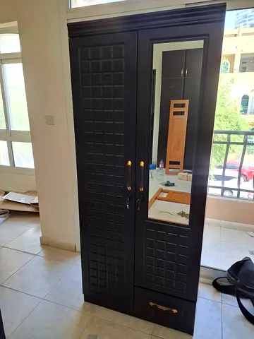Double door cabinet selling brand new
